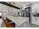 Modern kitchen with stainless steel appliances and a large island at 4790 E Dartmouth Ave, Denver, CO 80222