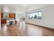 Living space with kitchen and backyard access, perfect for entertaining at 12702 E 105Th Ave, Commerce City, CO 80022