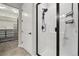 Beautiful bathroom shows sleek walk-in shower and door to walk-in closet at 2328 Saddle Back Ct, Fort Lupton, CO 80621