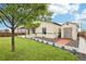 Beautiful backyard of the house includes a storage shed and covered patio at 2328 Saddle Back Ct, Fort Lupton, CO 80621