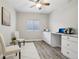Bright home office featuring built-in desk and natural light at 2328 Saddle Back Ct, Fort Lupton, CO 80621