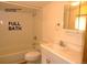 The full bath features a tub with shower, a sink with vanity, and a toilet at 28127 Knowles Rd # Ab&C, Evergreen, CO 80439