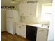 Bright kitchen featuring white cabinets, laminate countertops, and a stainless steel sink at 28127 Knowles Rd # Ab&C, Evergreen, CO 80439