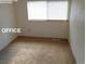 The office features neutral carpet and a window at 28127 Knowles Rd # Ab&C, Evergreen, CO 80439