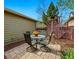 Backyard patio with outdoor seating and table for relaxing and entertaining at 2521 N Xenia St, Denver, CO 80238