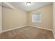 Cozy bedroom with carpet and window for natural light at 2521 N Xenia St, Denver, CO 80238