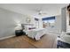 Comfortable bedroom with natural light, ceiling fan, and modern decor elements at 2521 N Xenia St, Denver, CO 80238
