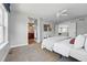 Spacious main bedroom with bathroom and kitchen access, bright and airy atmosphere at 2521 N Xenia St, Denver, CO 80238