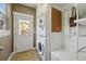 Functional mud room with washer, dryer, storage, and convenient access to the outside at 2521 N Xenia St, Denver, CO 80238