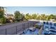 Apartment rooftop area offering parking, city views, and greenery at 800 N Pearl St # 303, Denver, CO 80203