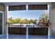 Cozy balcony with a view of neighborhood and a black metal guardrail at 800 N Pearl St # 303, Denver, CO 80203