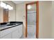 Bathroom with white vanity, chrome fixtures, and a tiled shower and tub at 800 N Pearl St # 303, Denver, CO 80203