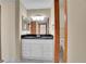 Bathroom featuring a marble floor, vanity and large mirror at 800 N Pearl St # 303, Denver, CO 80203