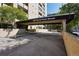 Inviting covered entrance at 800 North Pearl Street with beautiful trees surrounding the building at 800 N Pearl St # 303, Denver, CO 80203