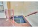 Cozy indoor jacuzzi pool with a brick surround for relaxing at 800 N Pearl St # 303, Denver, CO 80203