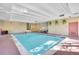 Indoor pool with brick accents, greenery, and natural light at 800 N Pearl St # 303, Denver, CO 80203