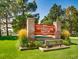 Beautiful entrance sign to the community at 9867 W Berry Dr, Littleton, CO 80123