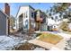 Charming townhouse showcasing a balcony, neat landscaping, and a welcoming entrance at 17118 E Whitaker Dr # E, Aurora, CO 80015