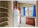 Bright kitchen with stainless steel appliances and tiled flooring at 17118 E Whitaker Dr # E, Aurora, CO 80015