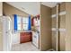 Functional kitchen featuring matching appliances, ample counter space, and natural light at 17118 E Whitaker Dr # E, Aurora, CO 80015