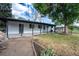 Expansive backyard with a covered patio offers ample space for outdoor activities and relaxation at 5041 S Julian St, Englewood, CO 80110