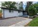 Charming home exterior featuring a welcoming entrance and easy access walkway at 5041 S Julian St, Englewood, CO 80110