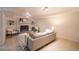 Cozy living room with a brick fireplace and built-in bookshelves at 5041 S Julian St, Englewood, CO 80110