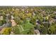 A neighborhood with homes, mature trees, and walking paths at 12008 E Amherst Pl, Aurora, CO 80014
