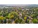 Aerial view of neighborhood with tree-lined streets and well-maintained homes at 12008 E Amherst Pl, Aurora, CO 80014