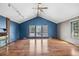Cozy living room featuring a fireplace, hardwood floors and great natural lighting at 12008 E Amherst Pl, Aurora, CO 80014