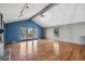 Bright and airy living room with large windows and hardwood flooring at 12008 E Amherst Pl, Aurora, CO 80014