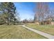 A walking path leads through well manicured lawns at 12008 E Amherst Pl, Aurora, CO 80014