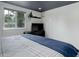 Bedroom with a picturesque window view, dark ceiling, and minimalist decor at 12229 Circle Dr, Conifer, CO 80433