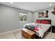 A cozy bedroom featuring a comfortable bed, soft carpet, and a window view to the outdoors at 12229 Circle Dr, Conifer, CO 80433