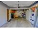 Spacious garage with ample storage, workbench, and room for vehicles and projects at 12229 Circle Dr, Conifer, CO 80433