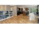 Open living area with hardwood floors, stainless steel appliances, and a view of the backyard at 12229 Circle Dr, Conifer, CO 80433