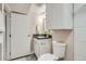 Well-lit bathroom with updated vanity, granite countertop, and stylish fixtures, creating a clean, modern space at 1538 Albion St, Denver, CO 80220