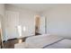 Cozy bedroom featuring hardwood floors and closet space at 1538 Albion St, Denver, CO 80220