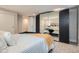 Well-designed bedroom featuring mirrored closet doors and soft carpeting for maximum comfort at 1538 Albion St, Denver, CO 80220