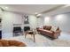 Well-appointed living room with ample seating, modern artwork, and neutral decor for a relaxing atmosphere at 1538 Albion St, Denver, CO 80220