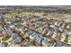 An aerial view shows a suburban neighborhood's layout with well-kept homes and streets, offering a sense of community at 6190 Sparrow Ave, Firestone, CO 80504