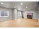 Basement area with finished floors, neutral colored walls, and large windows for lots of light at 6190 Sparrow Ave, Firestone, CO 80504