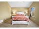 Spacious bedroom with comfortable bedding, bedside tables, and a large window at 6190 Sparrow Ave, Firestone, CO 80504