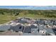 Scenic aerial view of a neighborhood near green hills and a clear blue sky at 74 Lullaby Ln, Castle Rock, CO 80109