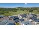 Scenic aerial view of a neighborhood near green hills under a clear blue sky at 74 Lullaby Ln, Castle Rock, CO 80109