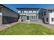 Well-maintained backyard with green grass and rock landscaping at 74 Lullaby Ln, Castle Rock, CO 80109