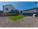 Well-maintained backyard with green grass and rock landscaping at 74 Lullaby Ln, Castle Rock, CO 80109