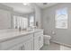 Bright bathroom featuring a single vanity with marble countertop, and modern fixtures at 74 Lullaby Ln, Castle Rock, CO 80109