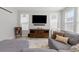 Relaxing living room featuring a comfortable sectional sofa and entertainment area at 74 Lullaby Ln, Castle Rock, CO 80109
