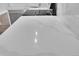 Close-up of a sleek white countertop with elegant light veining at 3132 Umatilla St # B, Denver, CO 80211